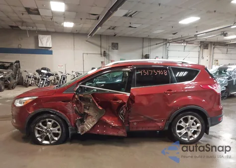 2016 Ford Escape Titanium z USA, uszkodzony, nr VIN 1FMCU9JX5GUA79598